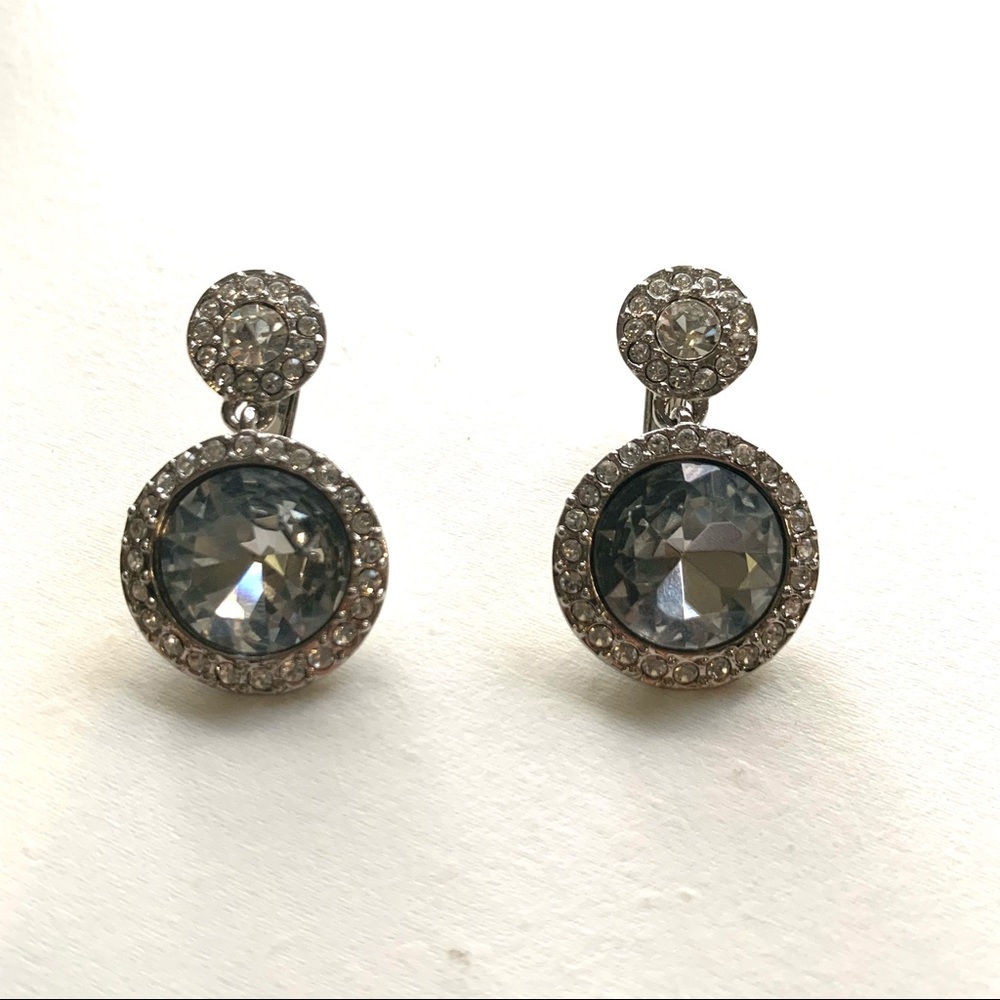 Silver jeweled clip on drop earrings.